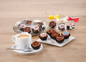 Logo-Pralinés im Säckli